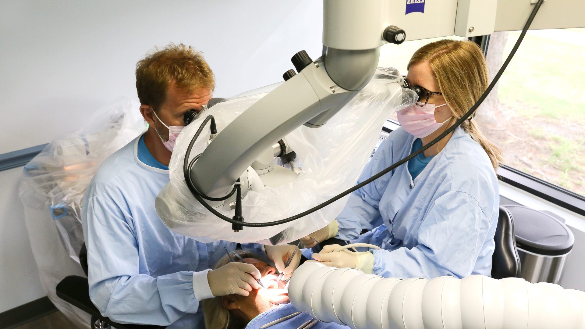 Dr Cross examines a patient for dental implant placement