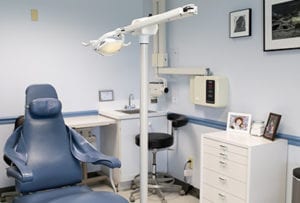 Blue dental chair and office equipment   j David cross dds
